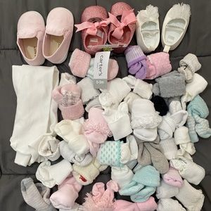 Bundle of baby girl shoes, socks, and tights